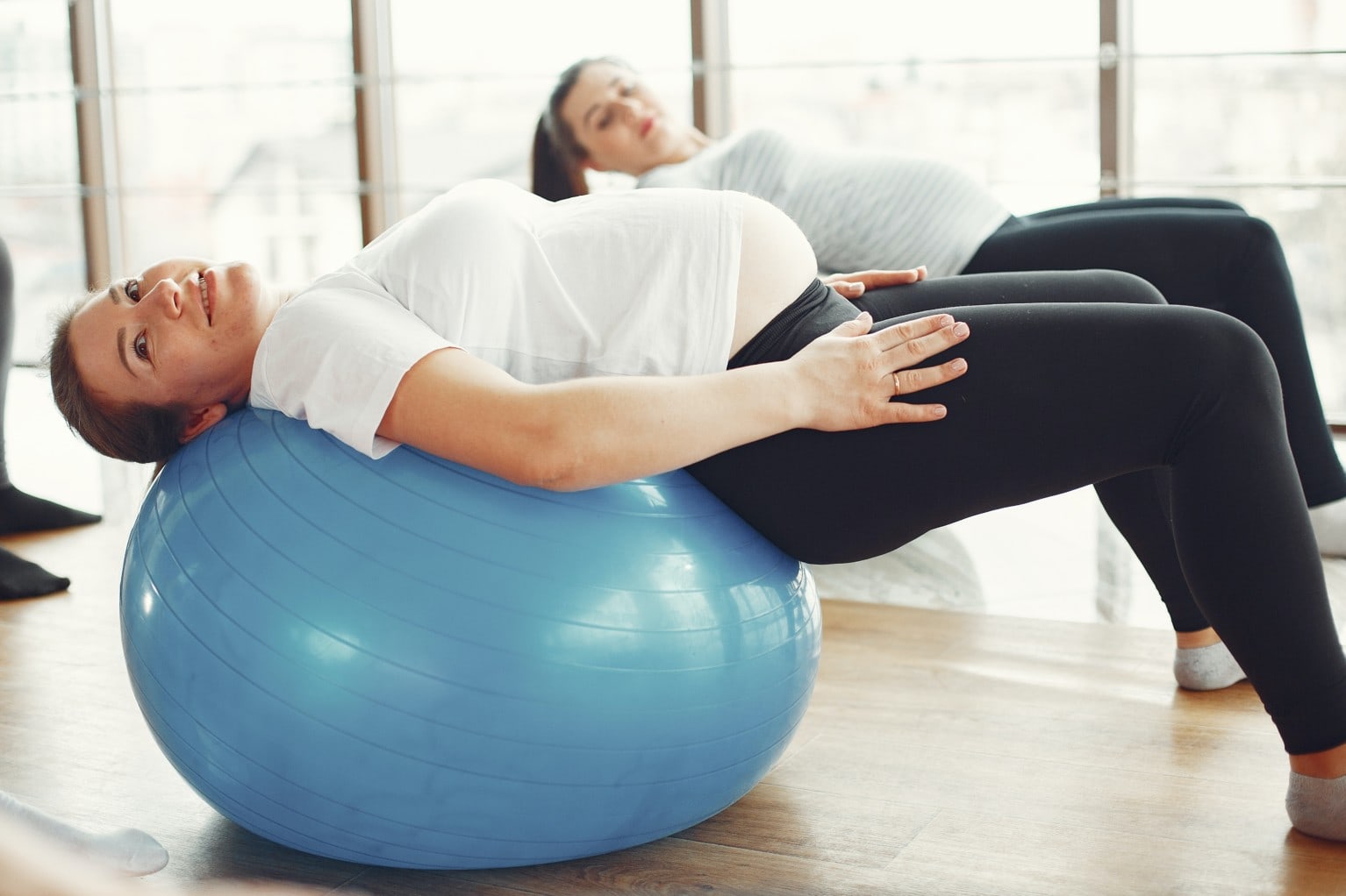 https://www.mothernurtureyoga.com.au/wp-content/uploads/2021/03/pregnancy-yoga-blog-woman-motivated-for-prenatal-exercise-767x511@2x.jpg